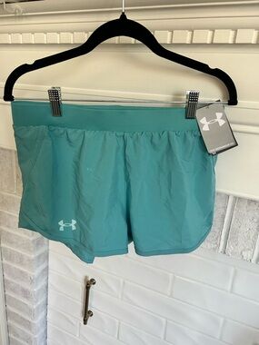 Under Armour Teal Youth Athletic Shorts. Large
